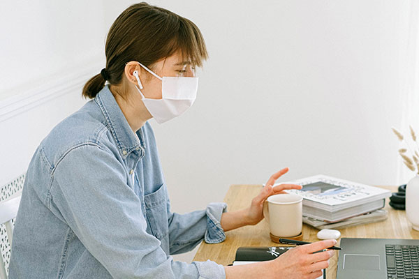 wearing mask drinking coffee